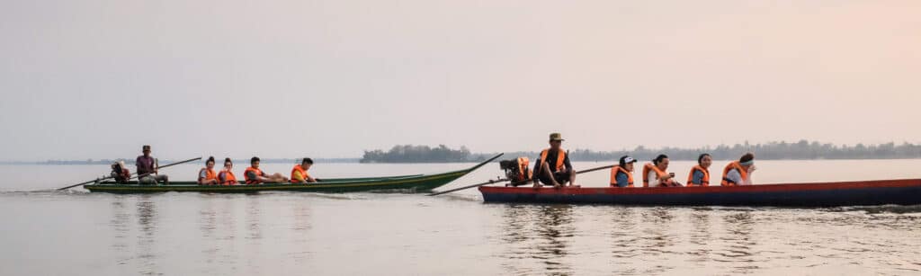 people on boats