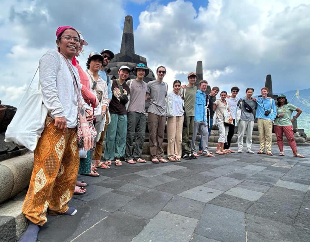 group standing in front of stupas